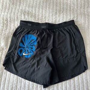 Nike Black Shorts with Blue Graphic Accent